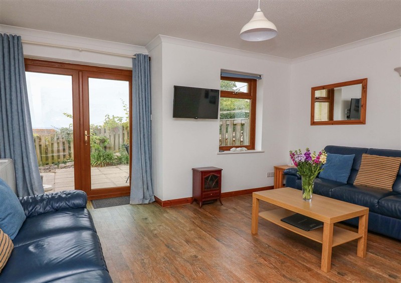 Relax in the living area at Surf View, Hope Cove