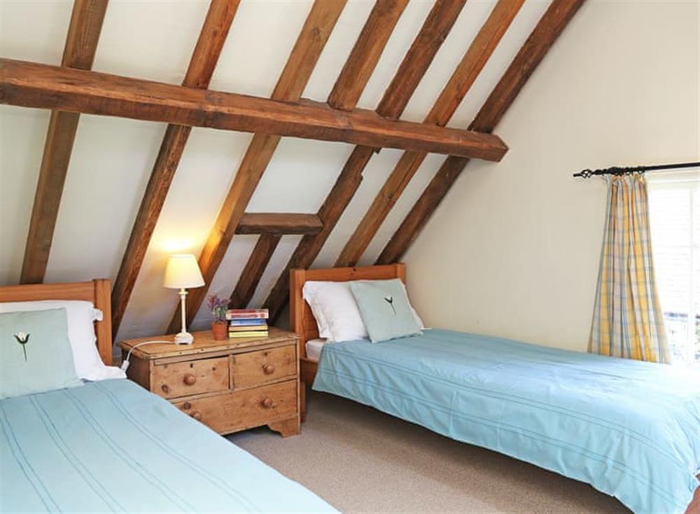 Twin bedroom at Surrey Hills Barn in Dorking, Surrey