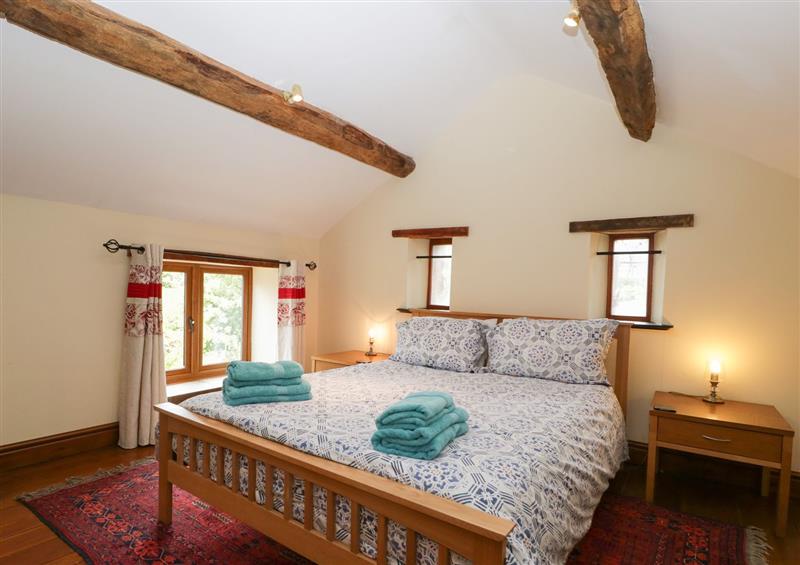 A bedroom in Sutton Barn at Sutton Barn, Hope Mansell