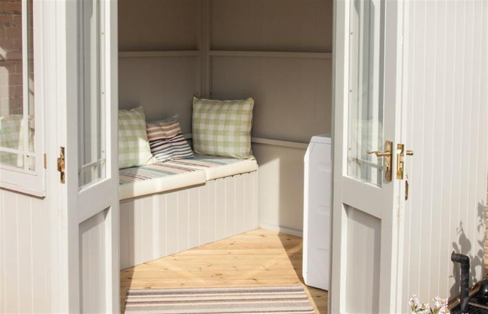 Lovely summerhouse, perfect for relaxing with coffee and a book at Sutton Cottage, Thornham near Hunstanton