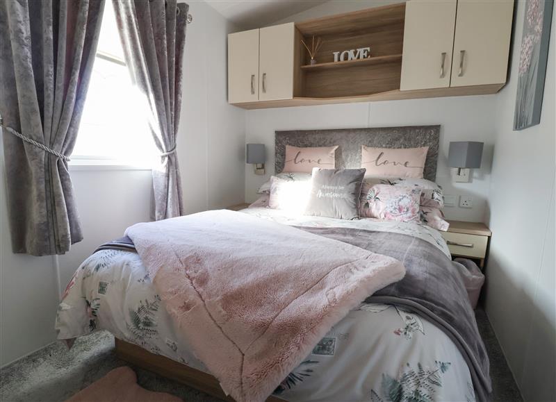This is a bedroom at Sw26, Rhyl