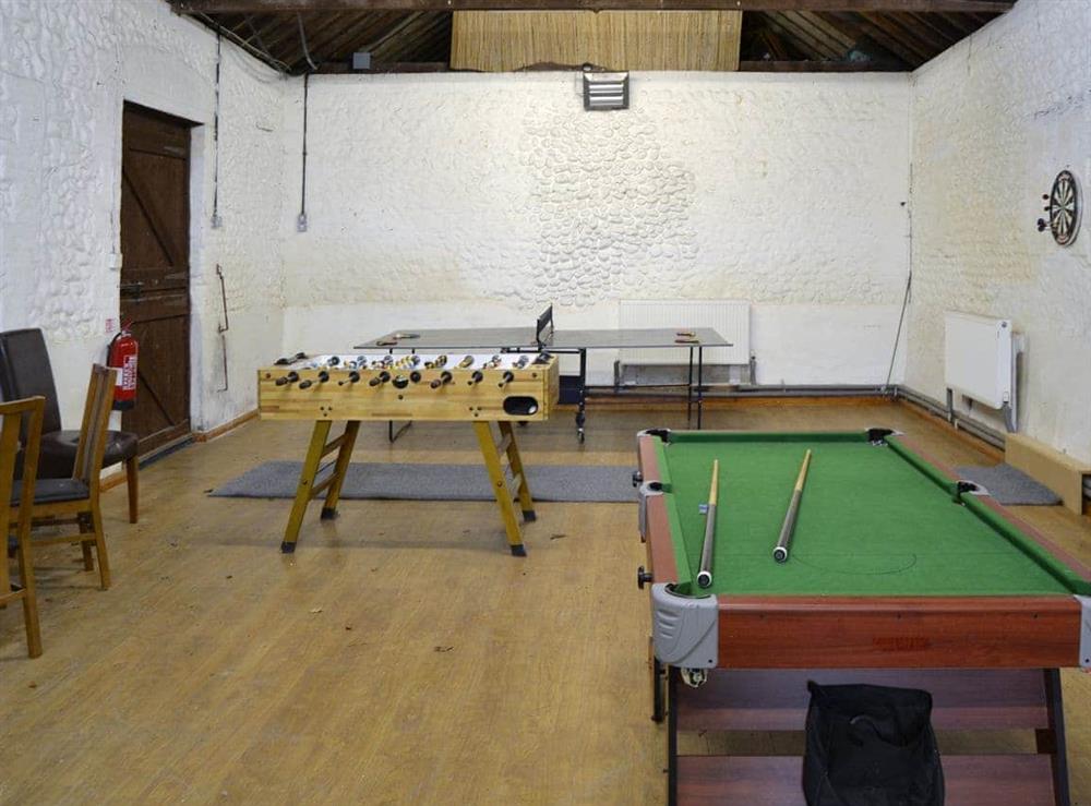 Shared indoor games room at The Cart Shed, 