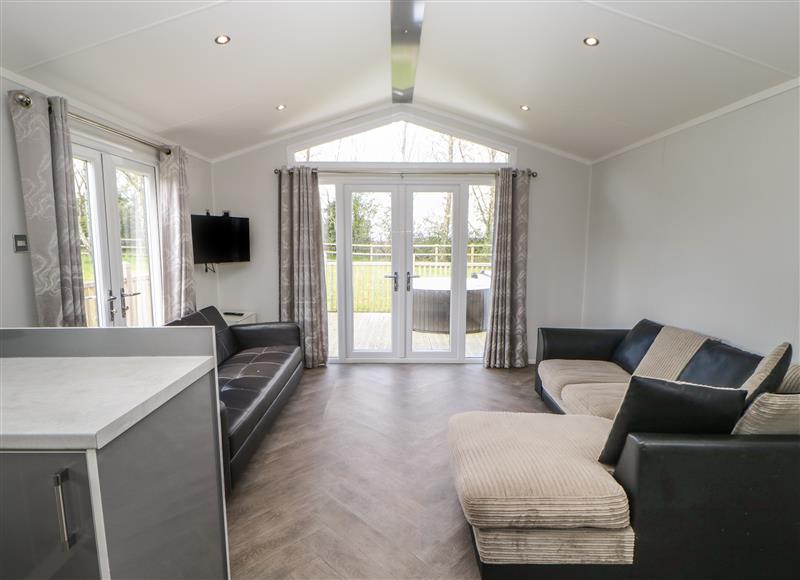 Relax in the living area at Swaledale Large Pod, Hutton Rudby