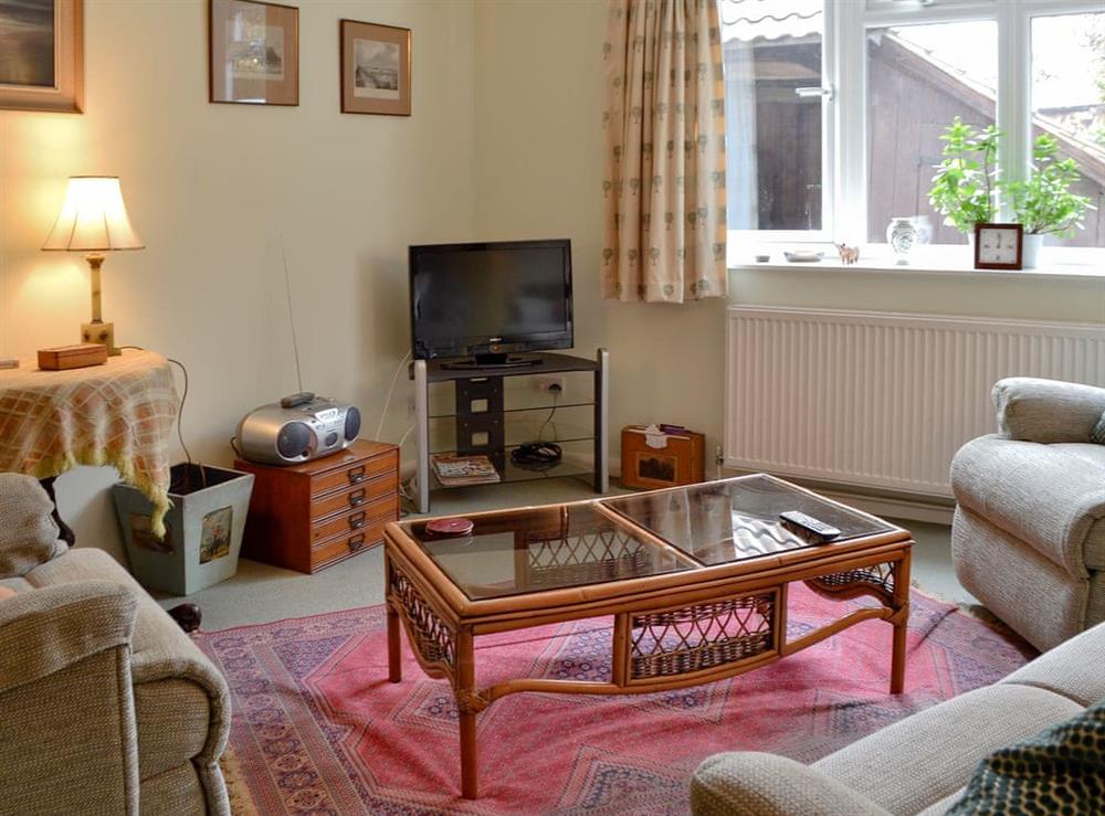 Comfortable living room at Swallow Barn in Chobham, near Woking, Surrey