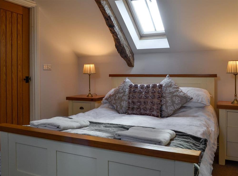 Double bedroom with en-suite shower at Swallow Barn in Torpenhow, near Wigton, Cumbria