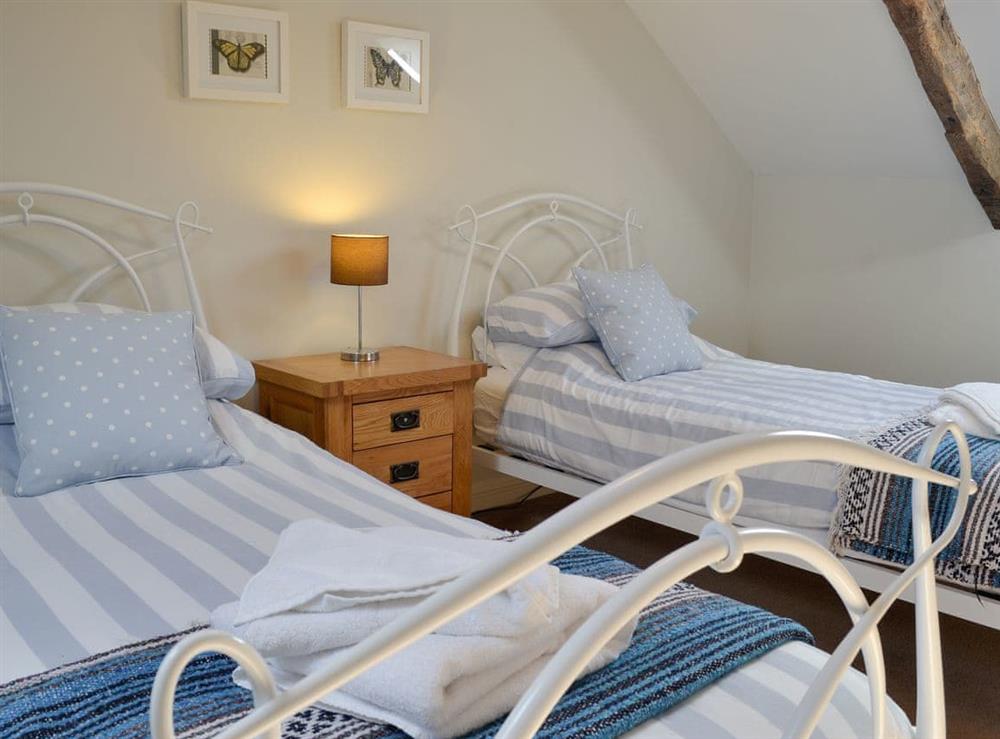 Twin bedroom at Swallow Barn in Torpenhow, near Wigton, Cumbria