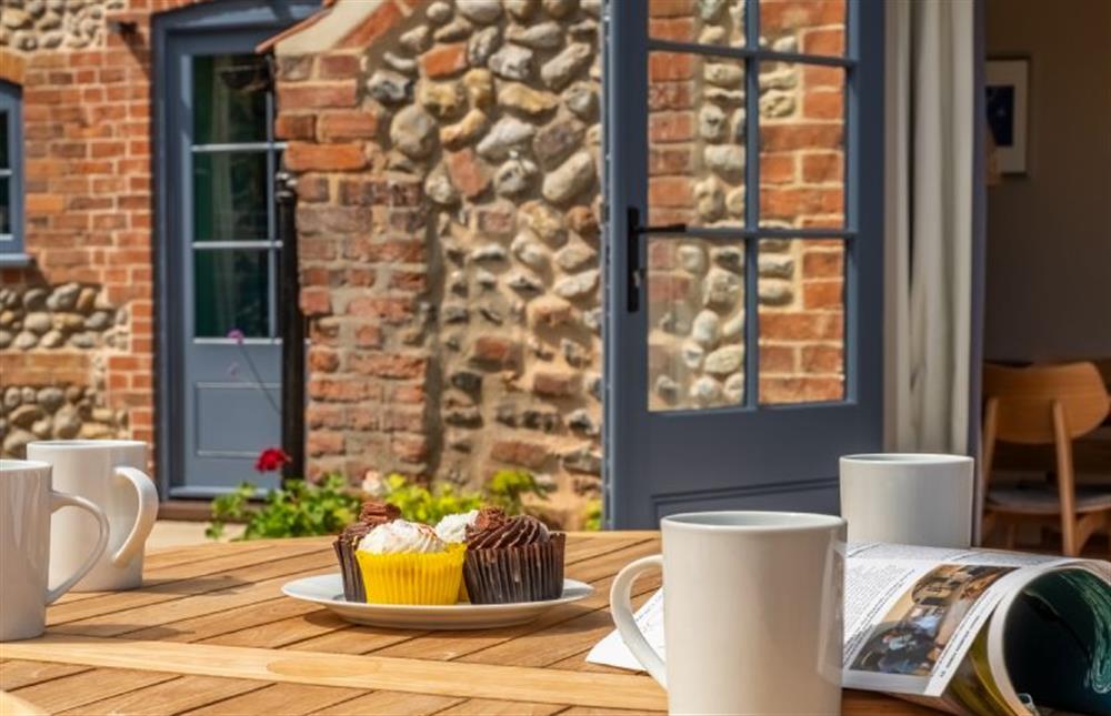 Plan your day with a coffee and cupcake?  at Swallow Cottage, Binham near Fakenham