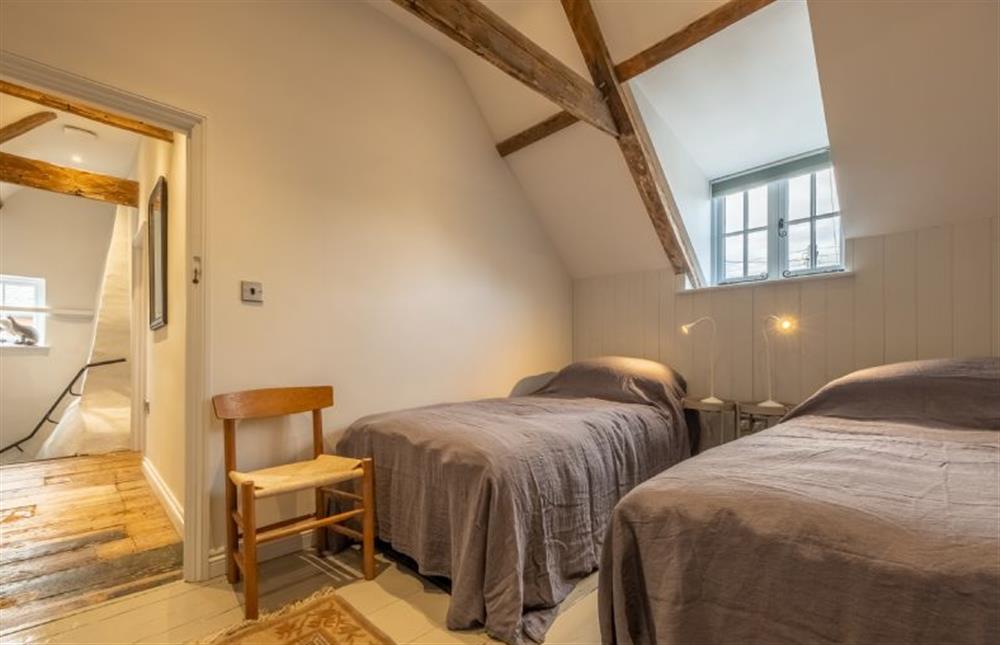 The twin beds can be made up as a 6’ super-king at Swallow Cottage, Binham near Fakenham
