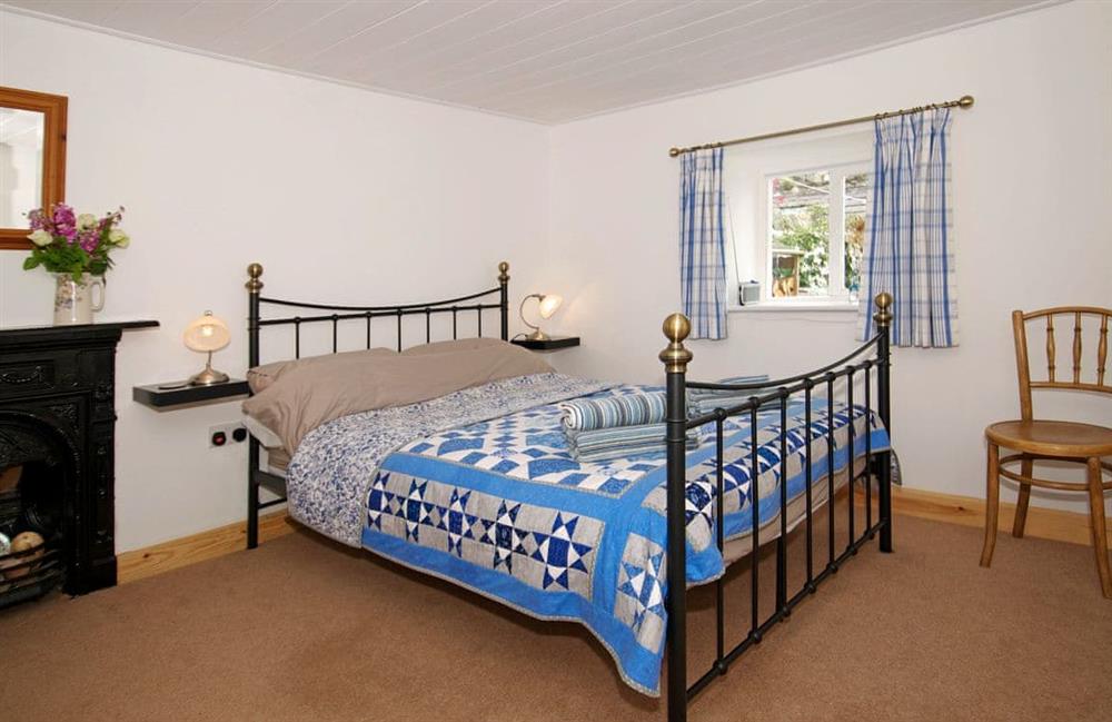 This is the bedroom at Swallow Cottage in Llandwrog, Gwynedd