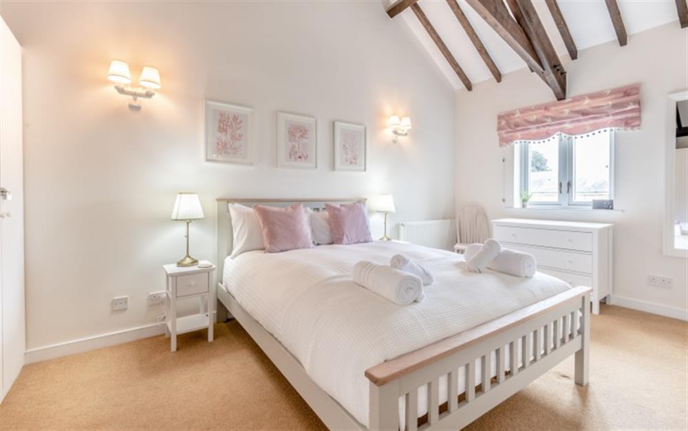 Master bedroom  at Swallow Cottage in Thurlestone