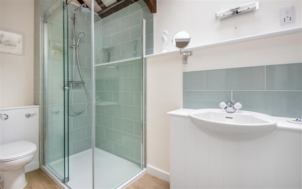 The shower room  at Swallow Cottage in Thurlestone