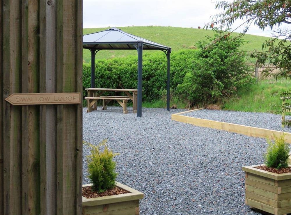 Outdoor area at Swallow Lodge in Bardennoch West, near Carsphairn, Kirkcudbrightshire