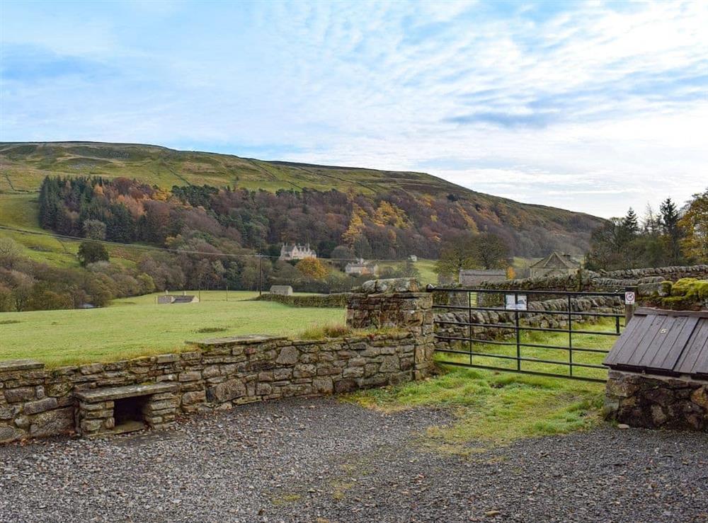 Garden and grounds surrounded by magnificent views at Swallowholm in Arkengarthdale, North Yorks., Surrey