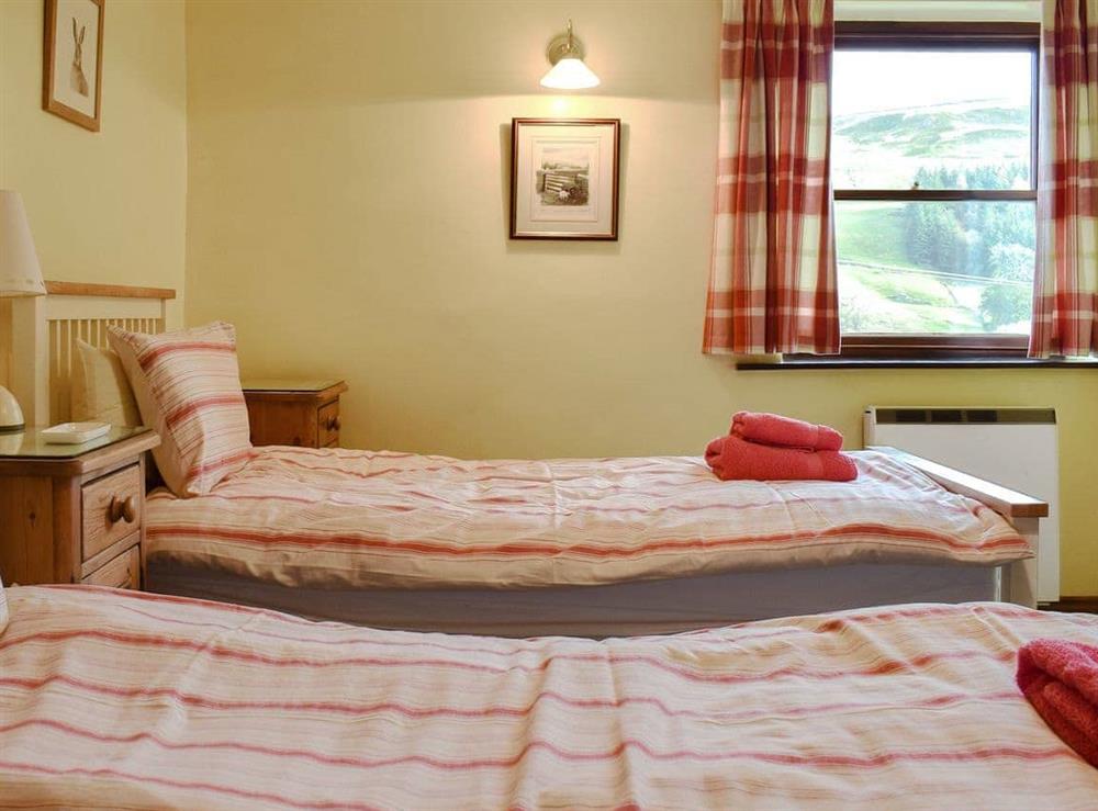 Twin bedroom with countryside views at Swallowholm in Arkengarthdale, North Yorks., Surrey