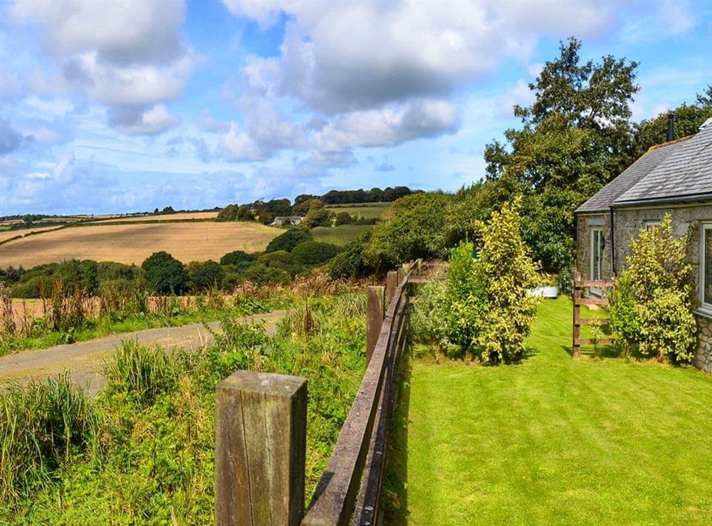Garden with delightful views at Swallows Barn in Godolphin Cross, Helston, Cornwall., Great Britain