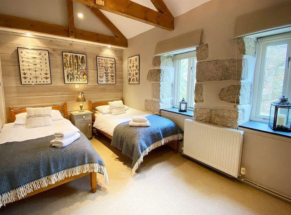 Twin bedroom at Swallows Barn in Godolphin Cross, Helston, Cornwall., Great Britain