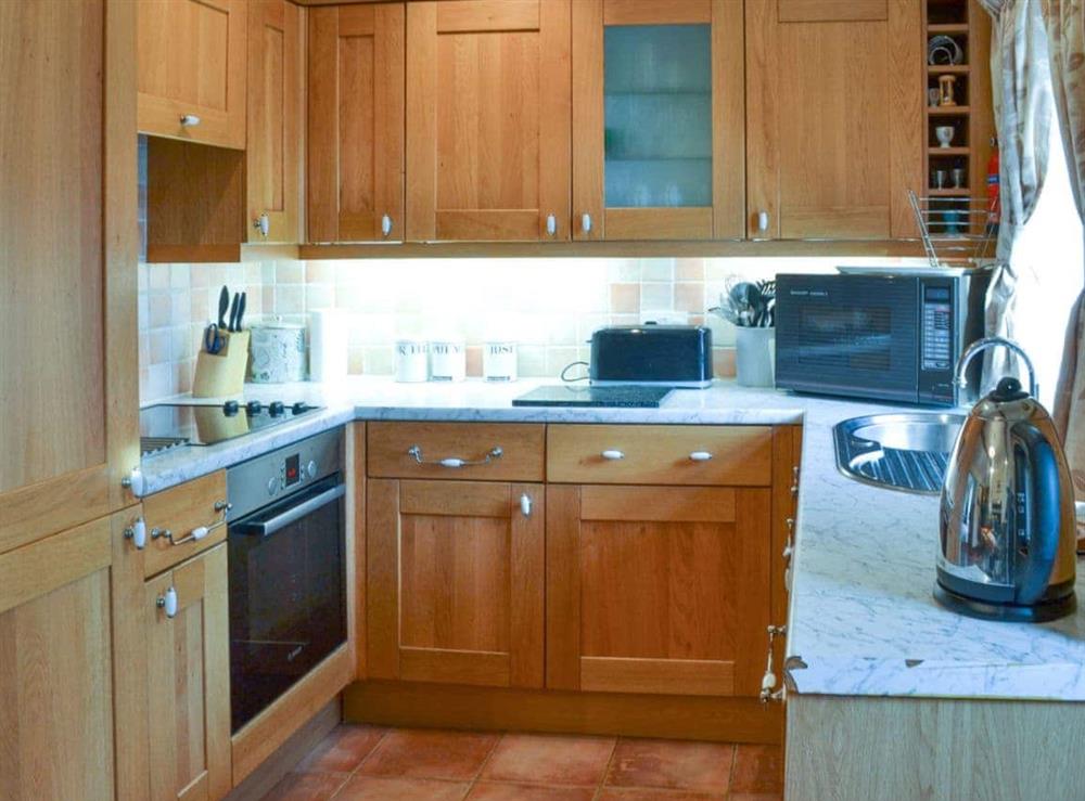 Attractive fitted kitchen at Swallows Nest in Harwood Dale, Scarborough, North Yorkshire