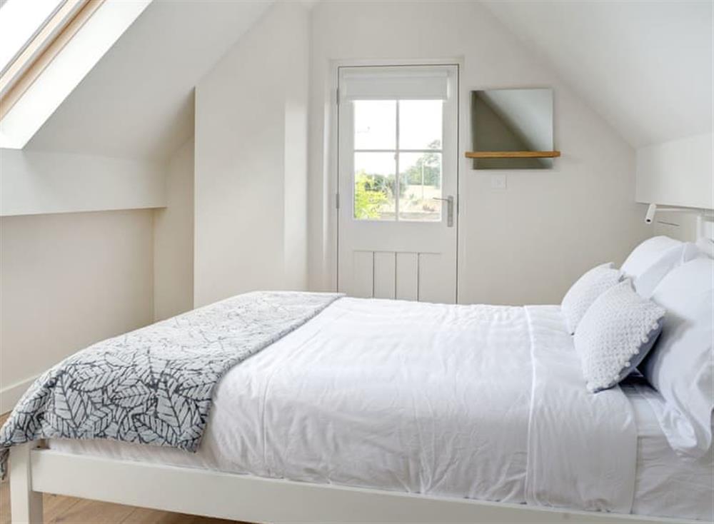 Double bedroom at Swallows Nest in Near Cirencester, England