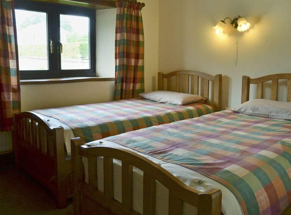 Cosy twin bedroom at Swallows Nest in Stowford, Okehampton, Devon