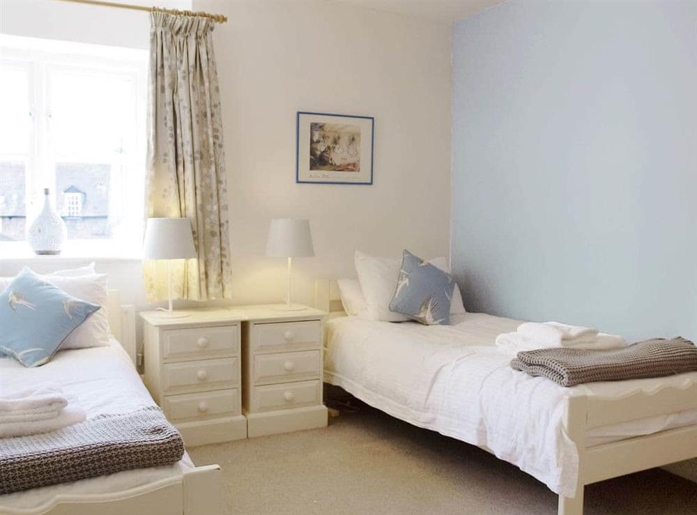 Well presented twin bedroom at Swallows Nest in Windermere, Cumbria