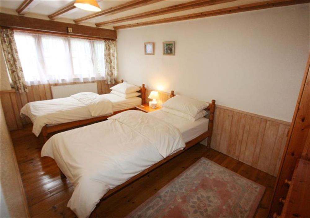 Twin bedroom at Swallows Retreat in Falmouth