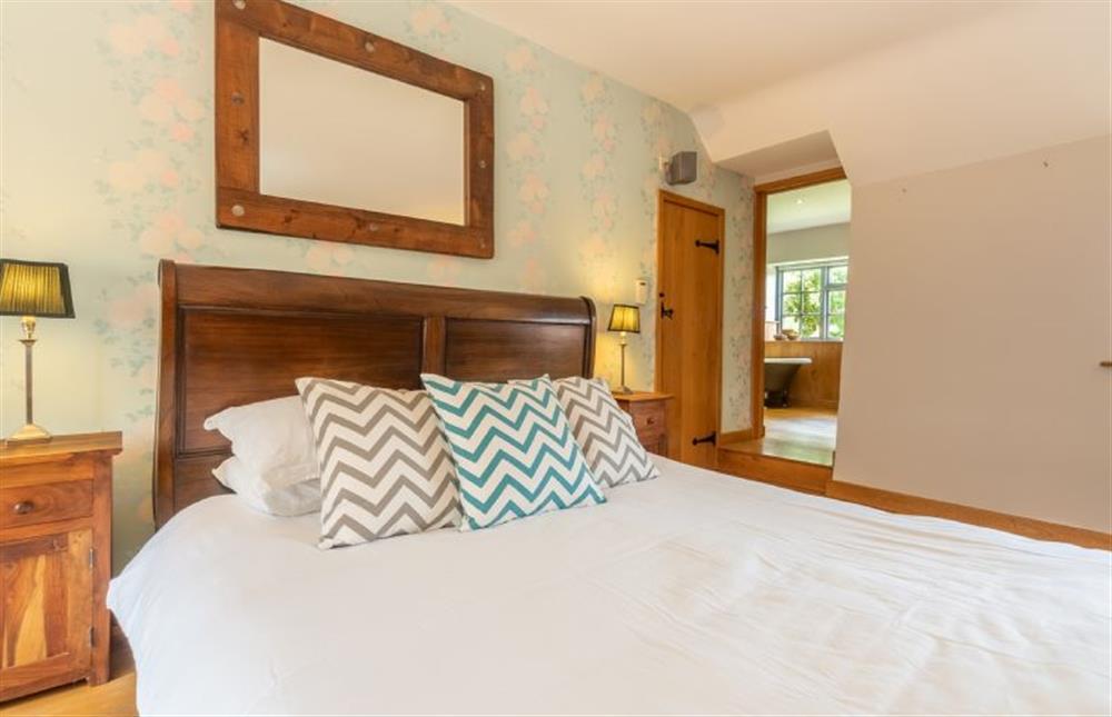 Swan Cottage: First floor Master bedroom with a super-king sized bed (photo 5) at Swan Cottage, South Creake near Fakenham