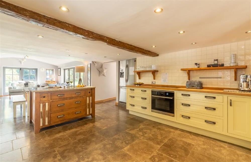 Swan Cottage: Large open plan kitchen with an island at Swan Cottage, South Creake near Fakenham