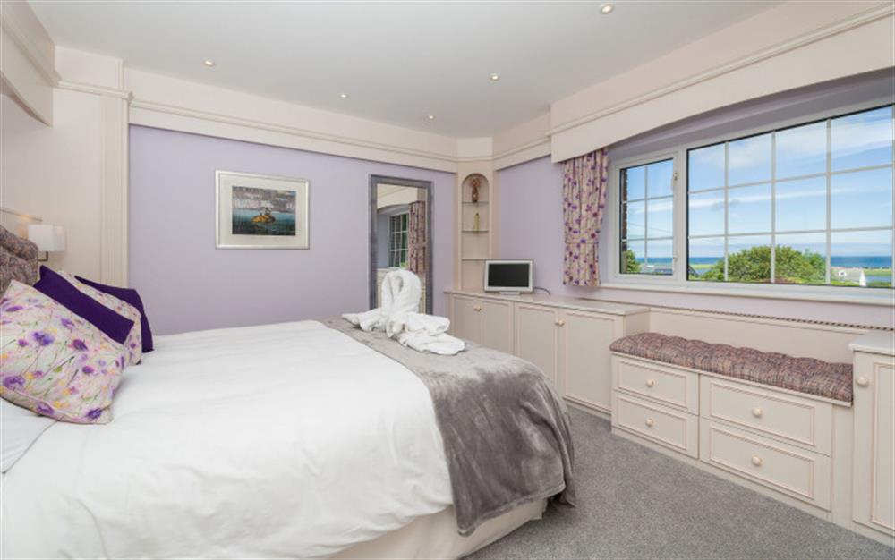 Master bedroom with sea views. at Swan Haven in Torcross