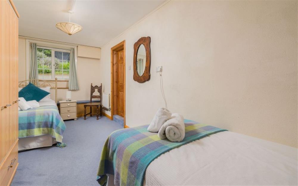 The ground floor twin bedroom. at Swan Haven in Torcross