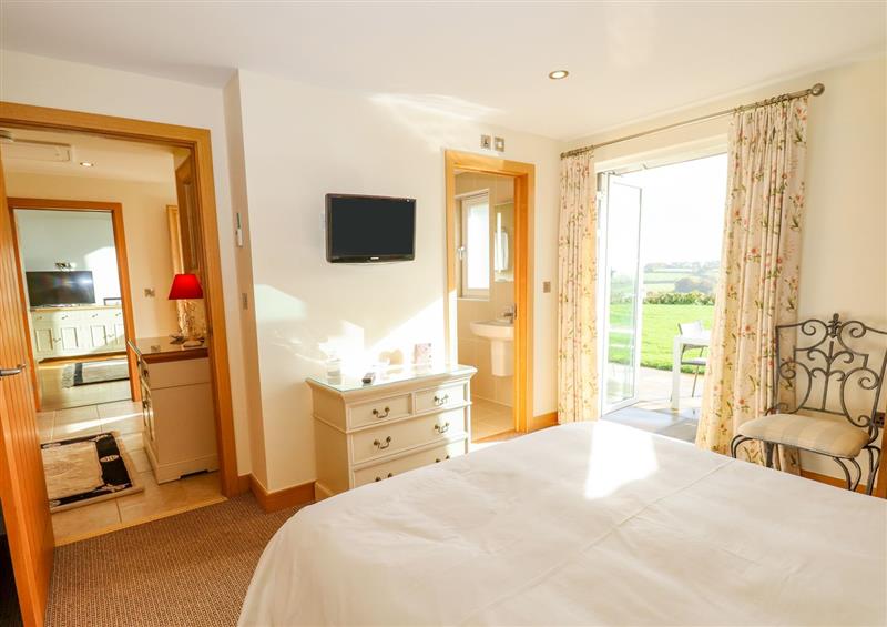 This is a bedroom at Swandown, 11 The Cygnet, Cricket St. Thomas