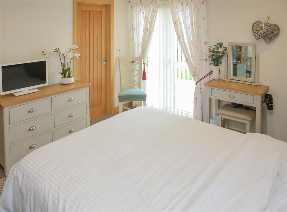 Double bedroom at Swandown Lodge in Cricket St Thomas, near Chard, Somerset