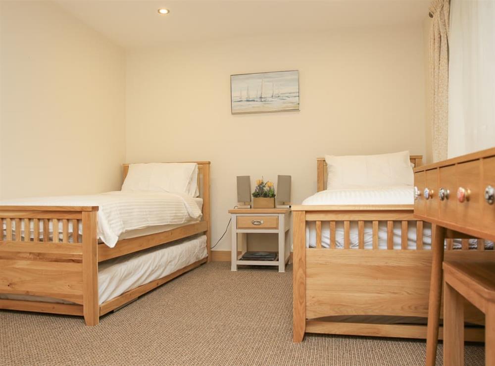 Twin bedroom at Swandown Lodge in Cricket St Thomas, near Chard, Somerset