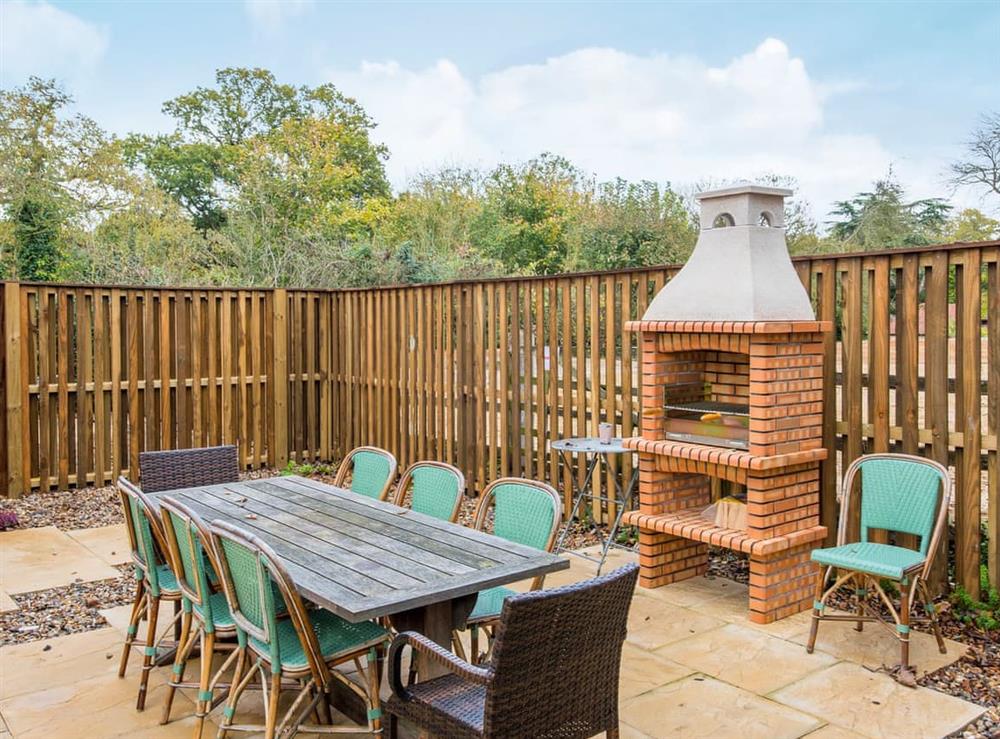 Patio with garden furniture at Cowslip Cottage, 