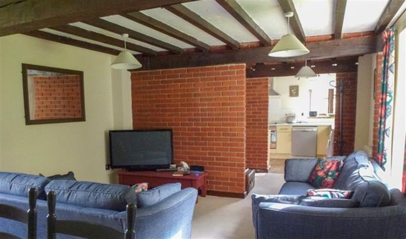 Relax in the living area at Sweet Briar Barn, Norfolk Broads