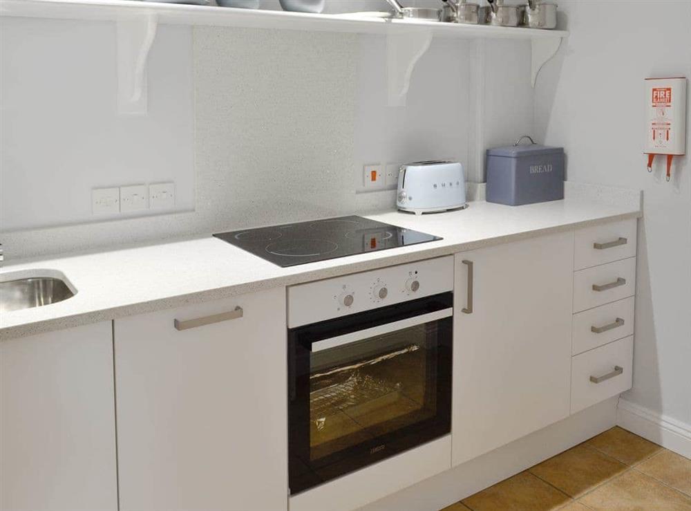 Well-equipped fitted kitchen at Sweet Briar in Bothenhampton, near Bridport, Dorset
