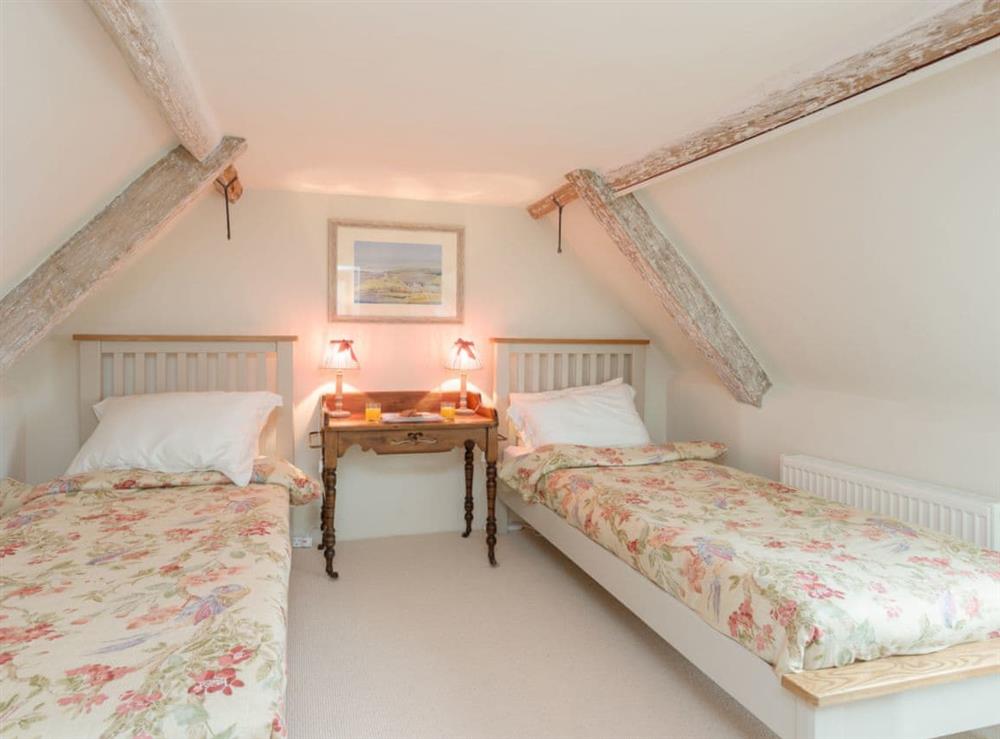 Quaint twin bedroom at Sweet Pea Cottage in Kingston, near Corfe Castle, Dorset
