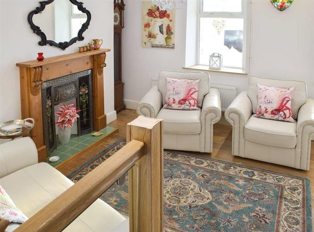 Comfortable living area (photo 2) at Sweet Pea Cottage in Pwll, near Llanelli, Dyfed