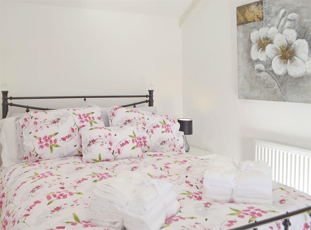 Comfy double bedroom at Sweet Pea Cottage in Pwll, near Llanelli, Dyfed