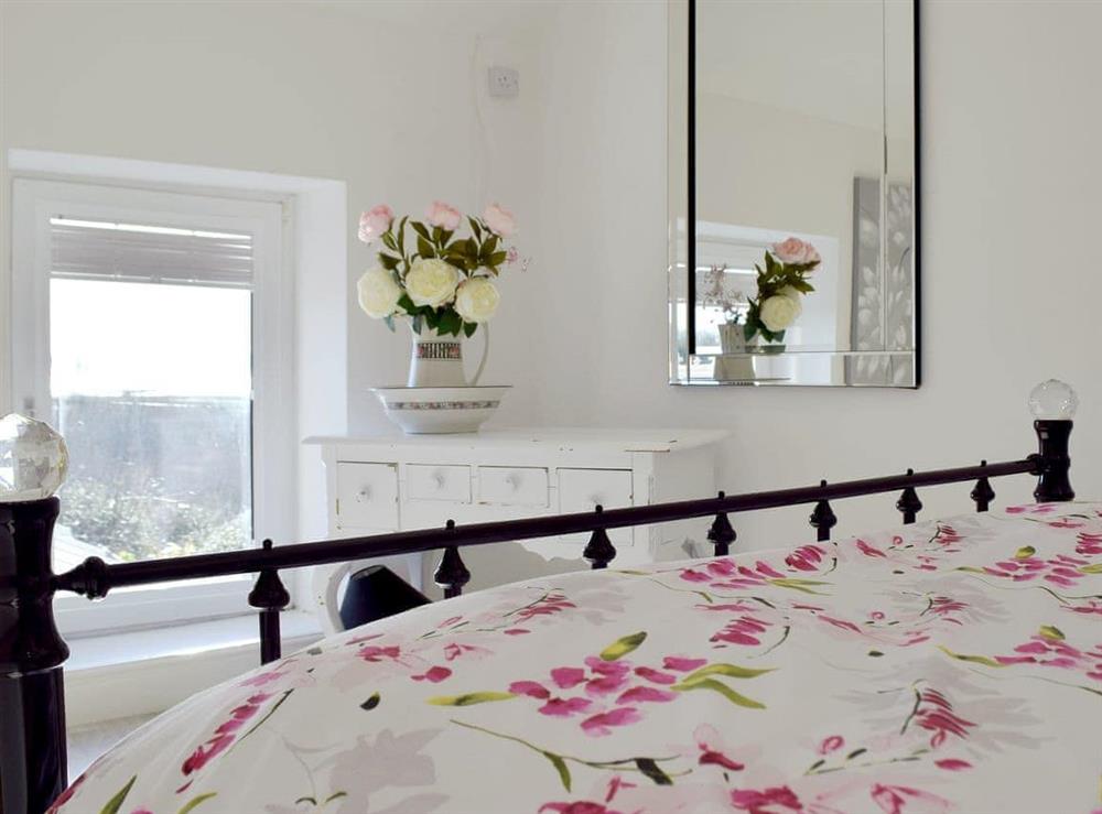 Light and airy double bedroom at Sweet Pea Cottage in Pwll, near Llanelli, Dyfed