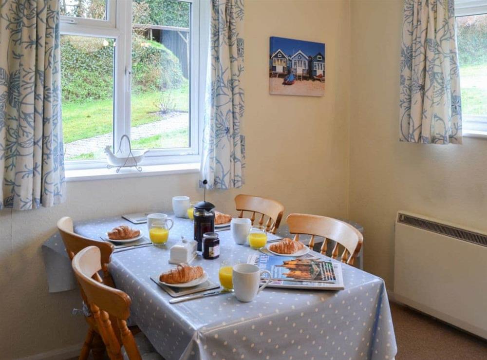 Lovely dining area with view of the garden at Sweet’s Close in Polgooth, St Austell, Cornwall., Great Britain