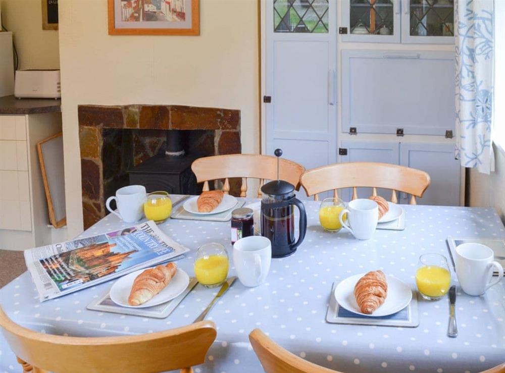 Sunny dining area in the farmhouse style kitchen diner at Sweet’s Close in Polgooth, St Austell, Cornwall., Great Britain