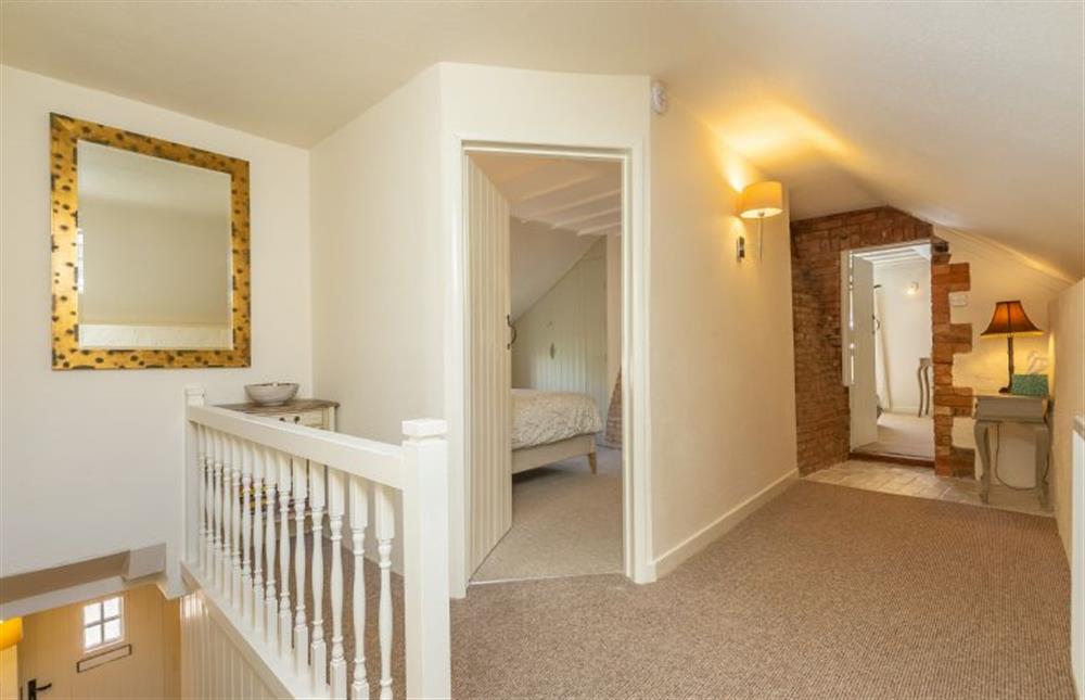 First floor:  Landing with doors to all rooms at Swift Cottage, Dersingham near Kings Lynn