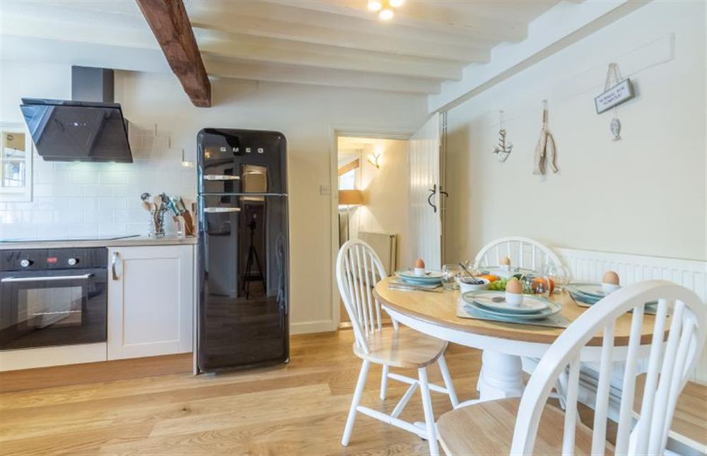 Ground floor:  Kitchen/breakfast room with table with seating for four at Swift Cottage, Dersingham near Kings Lynn