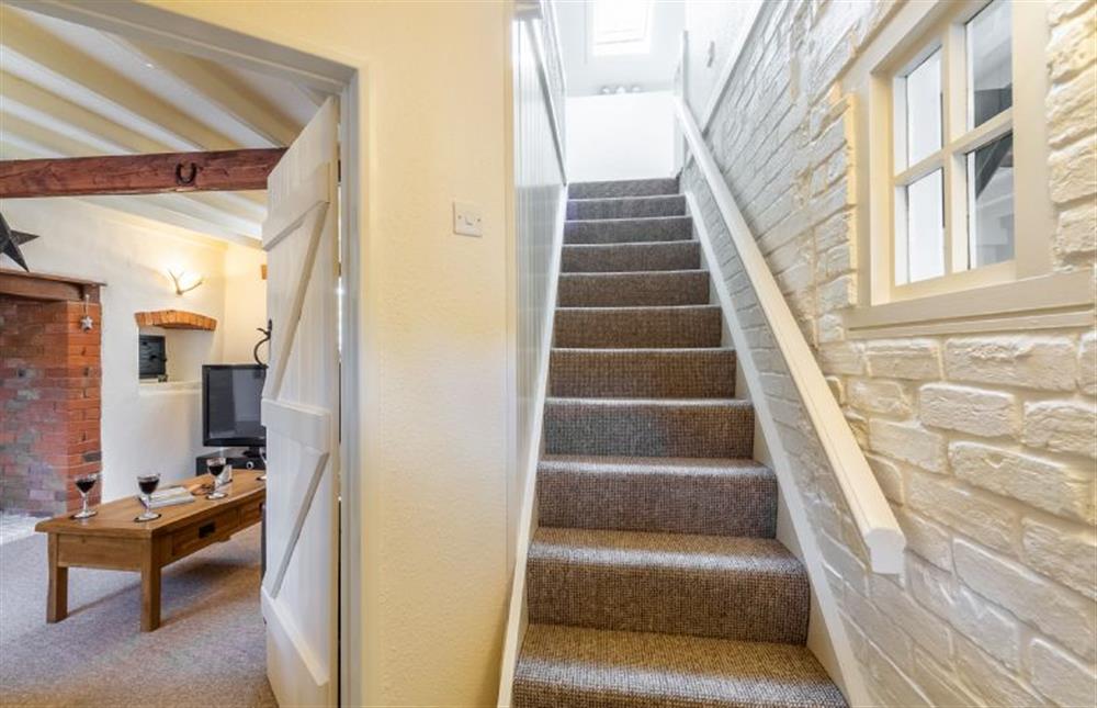 Ground floor:  Stairs to first floor at Swift Cottage, Dersingham near Kings Lynn