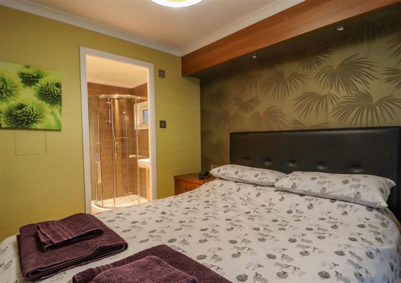 A bedroom in Swinsty Lodge at Swinsty Lodge, Fewston near Darley