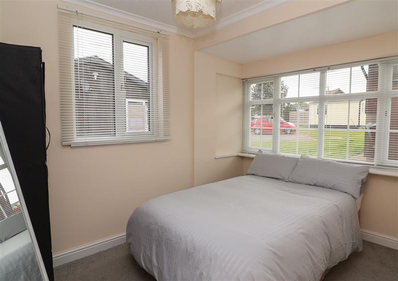 A bedroom in Swiss Cottage at Swiss Cottage, Wilsthorpe near Bridlington