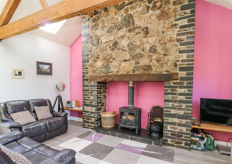 Relax in the living area at Swn y Nant, Tywyn