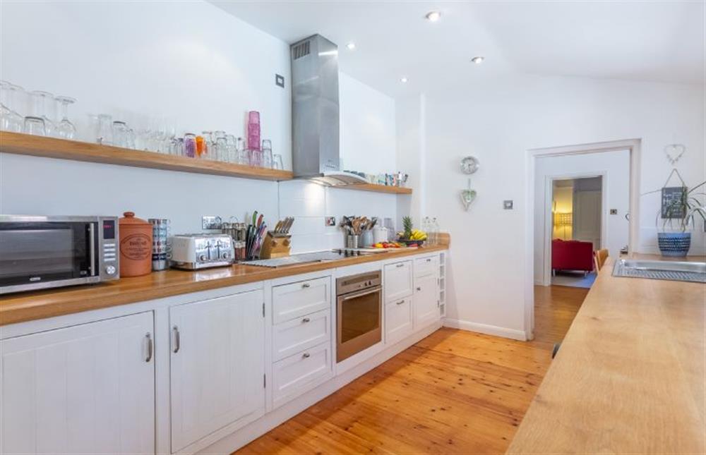 Ground floor: Kitchen with electric oven and halogen hob at Sybil Cottage, Holme-next-the-Sea near Hunstanton