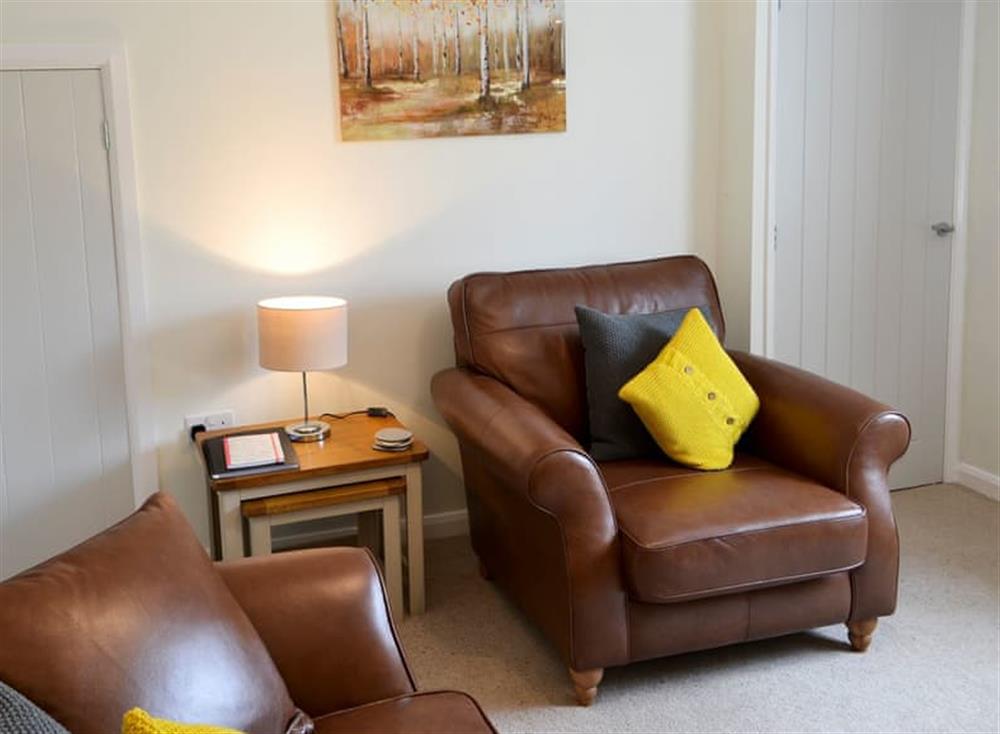 Cosy living room with wood burner (photo 3) at Sycamore Cottage in Barrasford, near Hexham, Northumberland