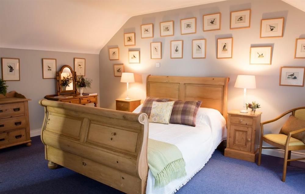 Master bedroom with double bed and en-suite shower room at Sycamore Cottage, Belle Isle Estate